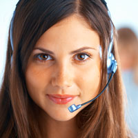 Customer service representative with headset, smiling, representing Alliance Service Pros plumbing and home improvement services.