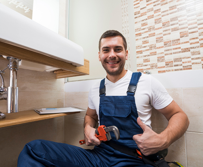 plumber cleaning a drain cherryhill