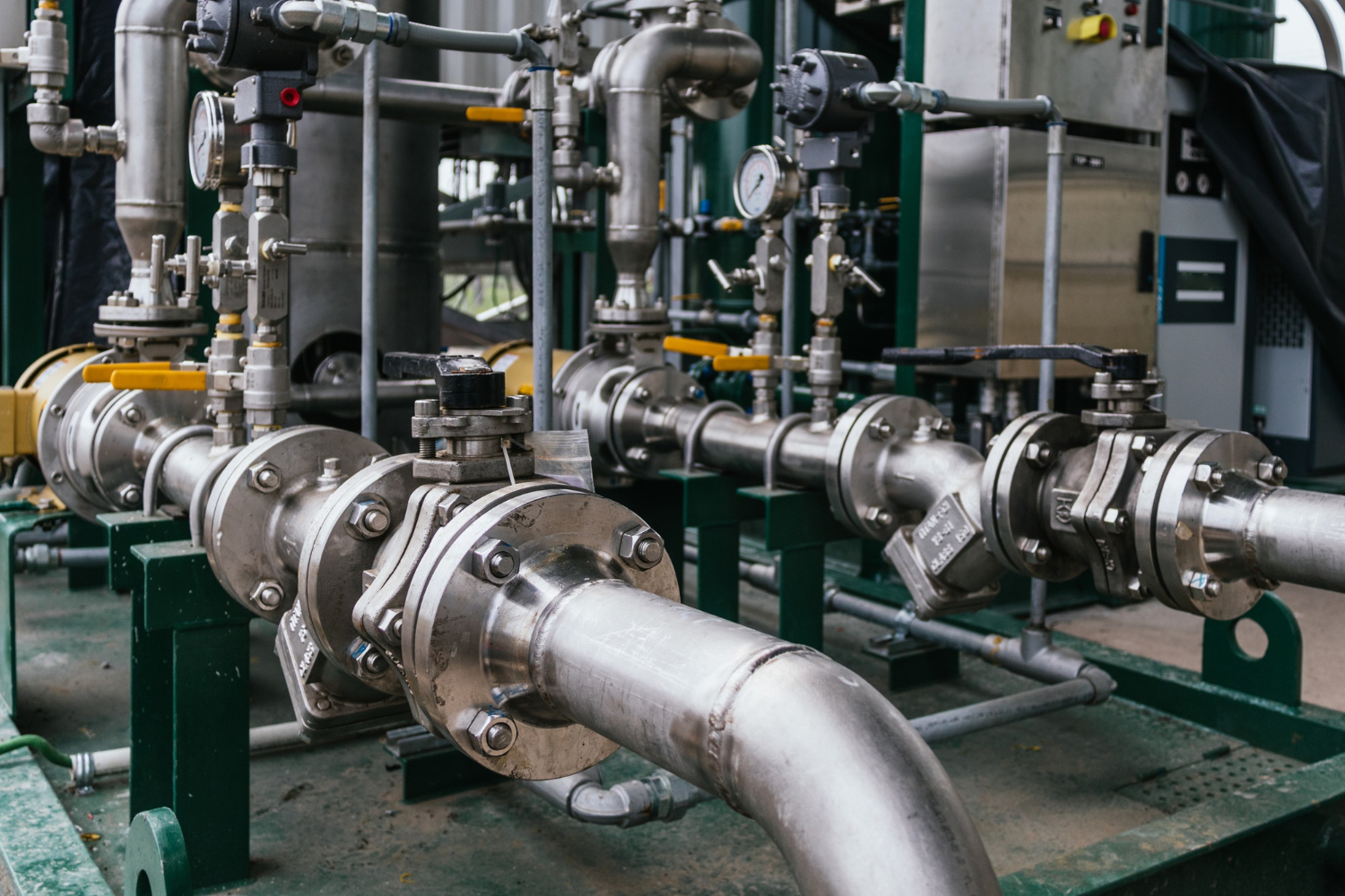 Industrial plumbing system with valves and gauges during repair services in Trenton, NJ.