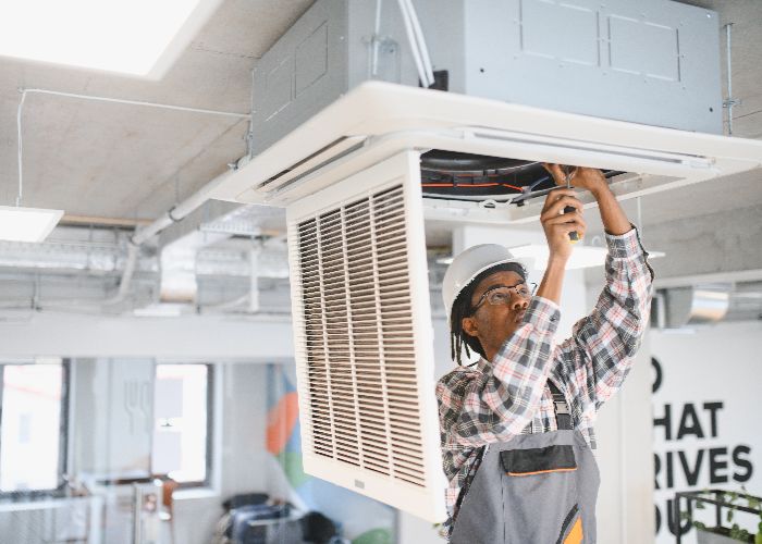 technician completes hvac maintenance in NJ